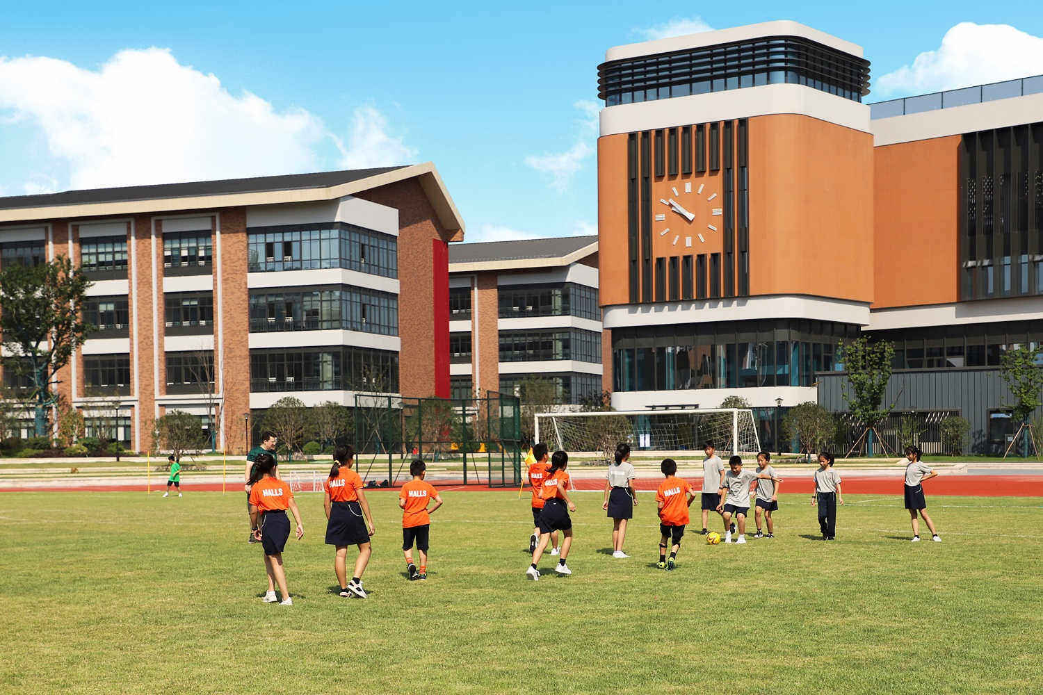 Children play on a sports field