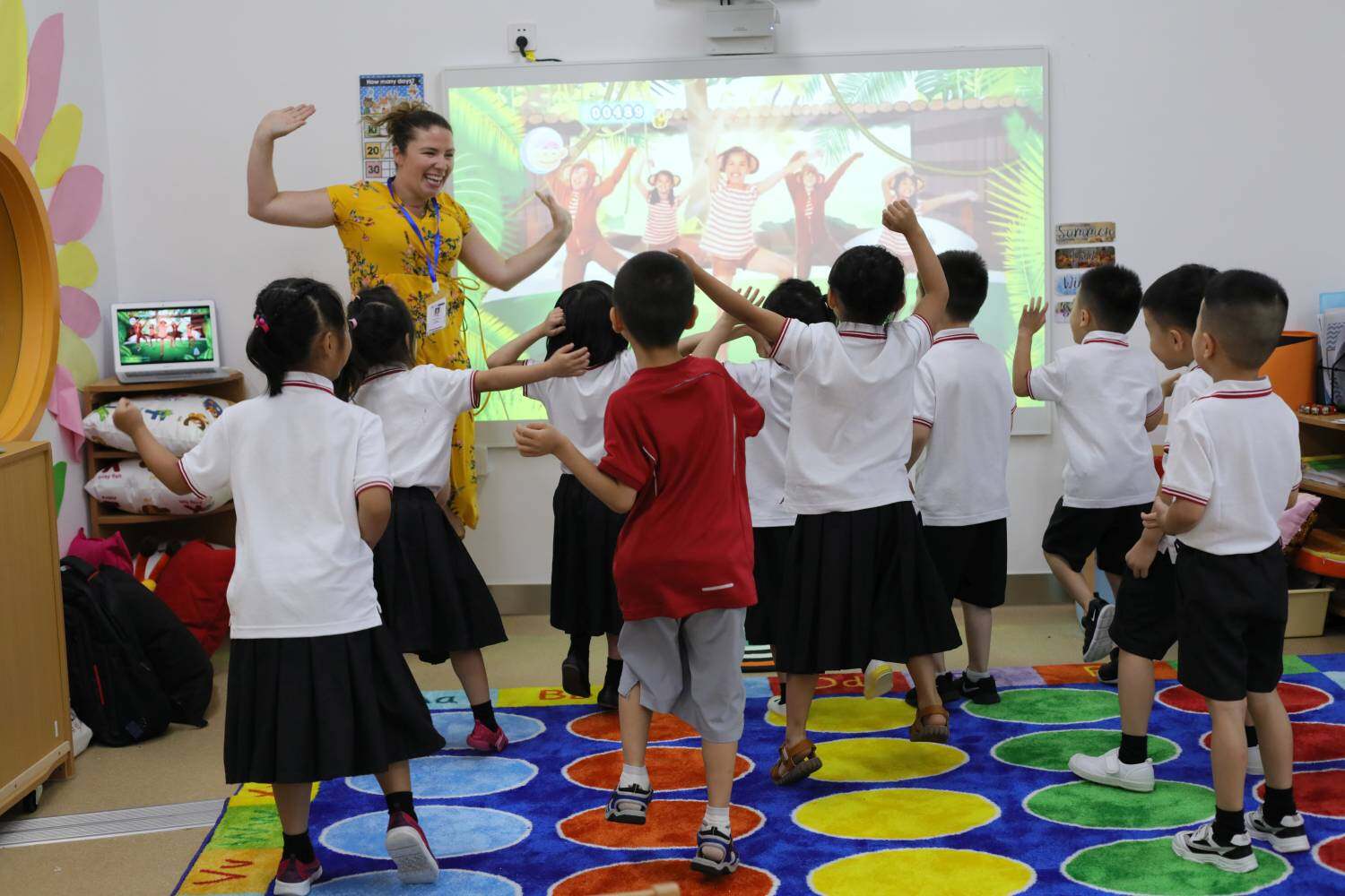 A teacher and students in a classroom in China